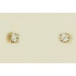 A 9ct gold and brilliant cut diamond ear studs, approximately 0.12ct each.