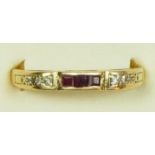 A 9ct gold ruby and diamond channel set ring, Q, 2gm