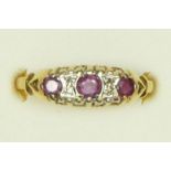 A 9ct gold ruby and diamond ring, P, 1.7gm