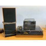 A Bush Audiosystem 300, consisting of tuner, cassette deck and turntable, with matching speakers,