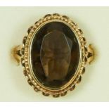 A 9ct gold mixed cut smokey quartz dress ring, 20 x 16mm, L, 5.3gm