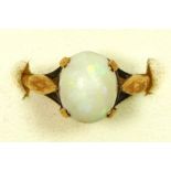 A 9ct gold and cabochon opal single stone ring, 10 x 8mm, L, 2.2gm