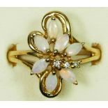 A 9ct gold opal and brilliant cut diamond flowerhead cluster ring, P, 3gm