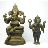 An Indian brass seat Ganesh statue, 32cm and a standing example (2).