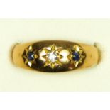 A Victorian 18ct gold star gypsy set sapphire and diamond three stone ring, Birmingham 1898, O, 3.