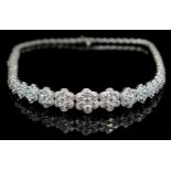 An impressive 18ct white gold (750 stamp) and diamond cluster collarette necklace, composed of sixty