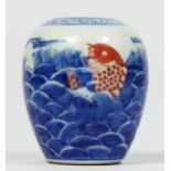 A Chinese Qing dynasty underglaze blue and red vase, decorated with two koi carp in waves, double
