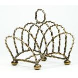 A Victorian silver six division arched toast rack, by Heath & Middleton, Birmingham 1890, raised