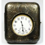 A silver Goliath pocket watch case, Birmingham 1906, the spot hammered case opening to reveal a