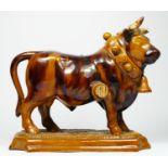 A Mafra, Caldas, Portugal treacle glazed pottery novelty decanter, in the form of a bull,