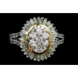 A 9ct gold, brilliant and baguette cut diamond cluster ring, limited edition of 40 pieces, diamond