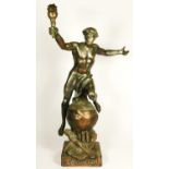 L'Aviation, an early 20th century bronzed spelter trophy/statue, depicting a youth holding a flaming