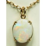 A 9ct gold mounted opal pedant, 14 x 12mm, 6gm, the setting converted from a ring.