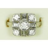 An Art Deco style diamond set panel, the central brilliant cut stone approximately 0.30cts, bordered