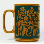 A 1970s Hornsea mug, designed by John Clappison, depicting a Hull City football team, dark teal