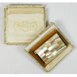 Melissa, a gilt metal and mother of pearl musical ladies compact, 7.5 x 5 x 1.5cm, instructions,