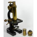 An unbranded microscope, possibly made by R & J. Beck, London, metal construction with polished