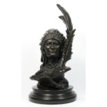 Unsigned, a 20th century cast bronze of a Native American chief with eagle, 33cm.