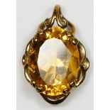 A 9ct gold mounted oval citrine pendant, the mixed cut stone of good colour, stone, 20 x 15mm, 5.3gm