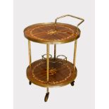 An Italian two tier mahogany drinks trolley with inlaid floral marquetry decoration, pierced brass