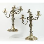 A German 19th century pair of three light silver candelabra, Augsburg date letter P, by IPH, zigzag,