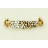 A 9ct gold and brilliant cut diamond five cluster dress ring, M, 1.8gm