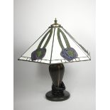 Tiffany style leaded and stained glass lamp, by Interiors 1900, of hexagonal form, raised on a