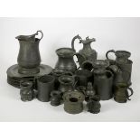 A collection of early 20th century pewter, to include 6" diameter plates, jugs, tankards and others