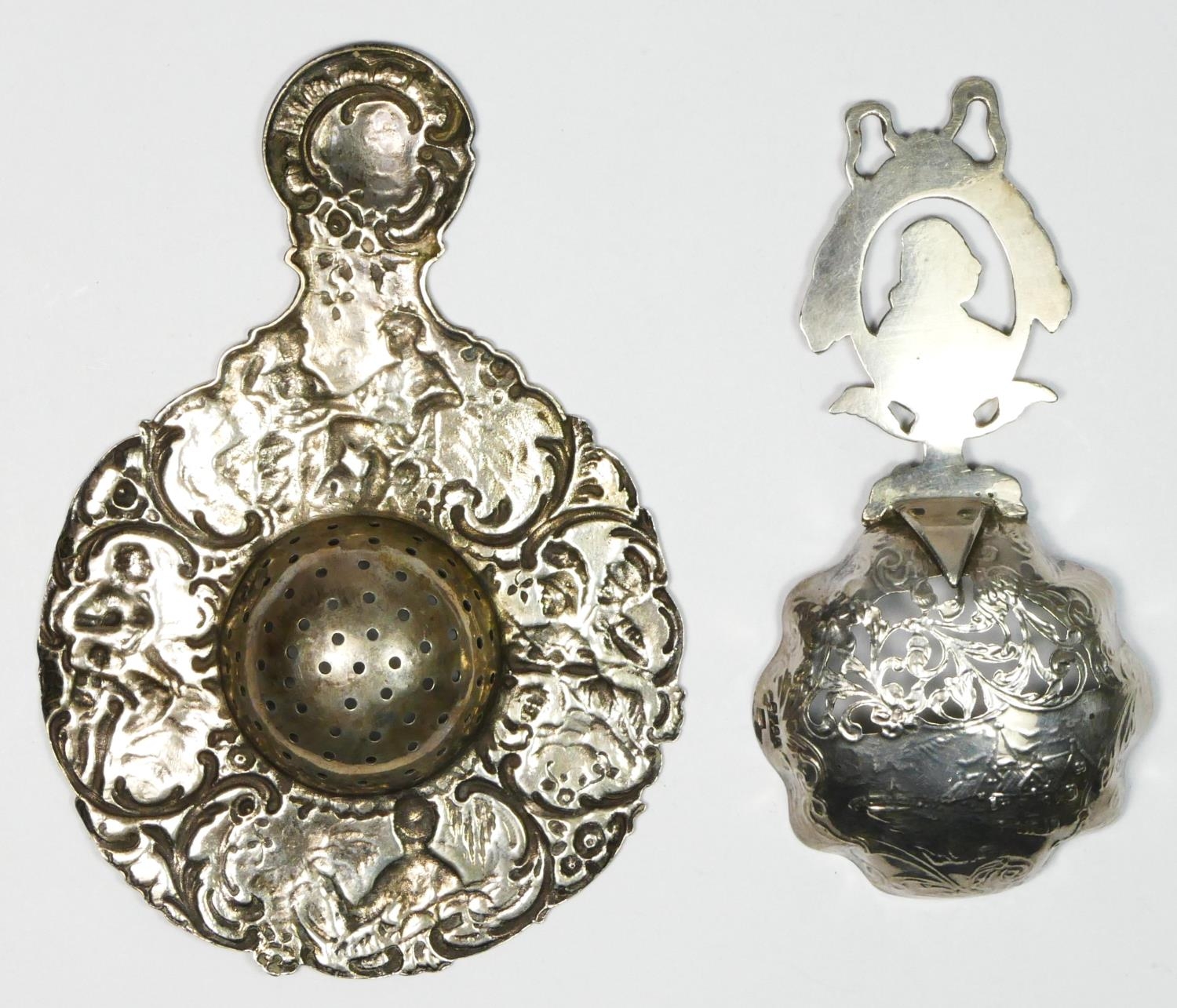 A Dutch silver straining spoon, Chester import 1900, with cast William of Orange handle and a German - Image 2 of 2