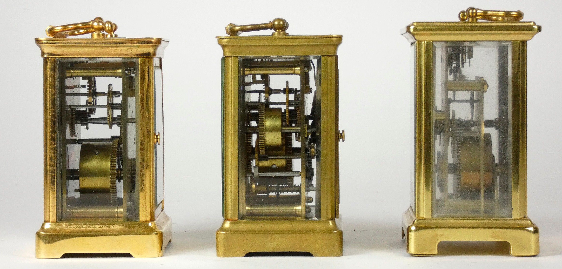 Three early 20th Century brass carriage clocks, white enameled dials with Roman numerals, 8 day - Image 2 of 3