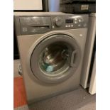 A Hotpoint washing machine, 7kg, model WMEUF 743. W59cm, D51cm, H84cm.