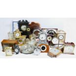 A collection of mid 20th century and later clocks, to include mantel clocks, wall clocks, carriage