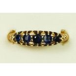 An Edwardian 18ct gold and sapphire five stone ring, Birmingham 1907, T, 3.9gm