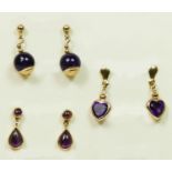 A pair of 9ct gold mounted amethyst heart ear rings and two other pairs of amethyst ear rings.