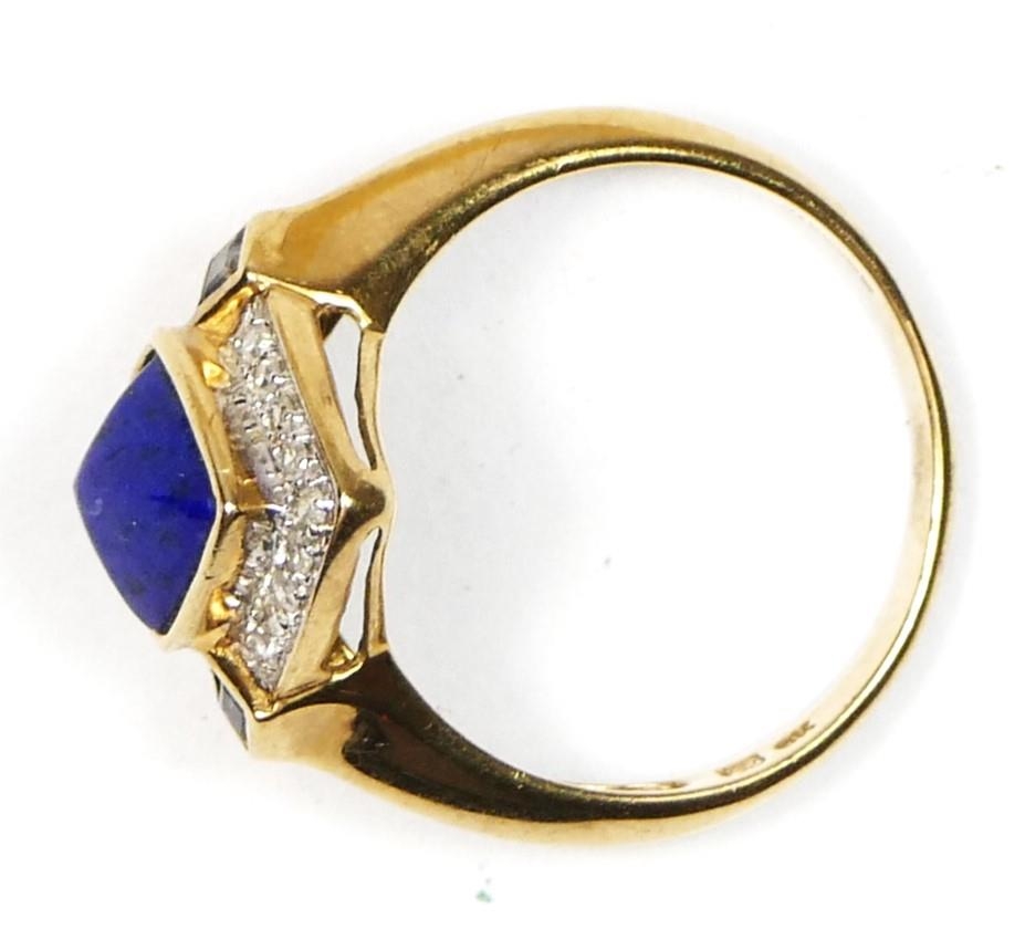 A 9ct gold, lapis lazuli and diamond dress ring, the lozenge collet set stone bordered by 18 - Image 2 of 2