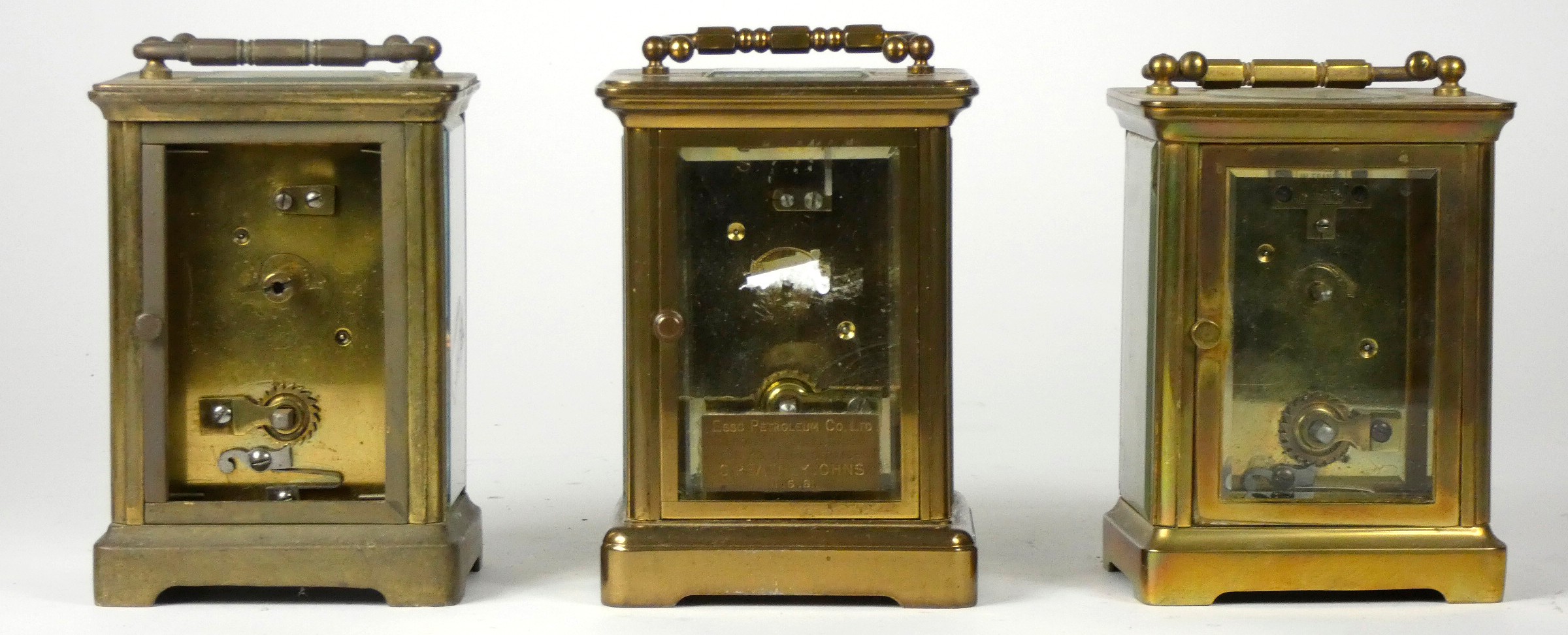 Three French mid 20th Century brass carriage clocks, white enameled dials with Roman numerals, - Image 3 of 3