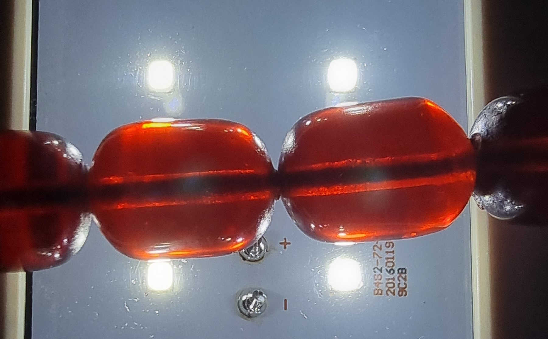 A cherry red amber bead necklace, 63gm, the largest bead 17 x 12mm - Image 6 of 6