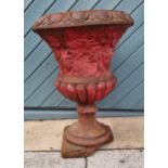 A Victorian terracotta garden urn, with grape and vine decoration, pedestal A/F, dia 43cm ht 60cm