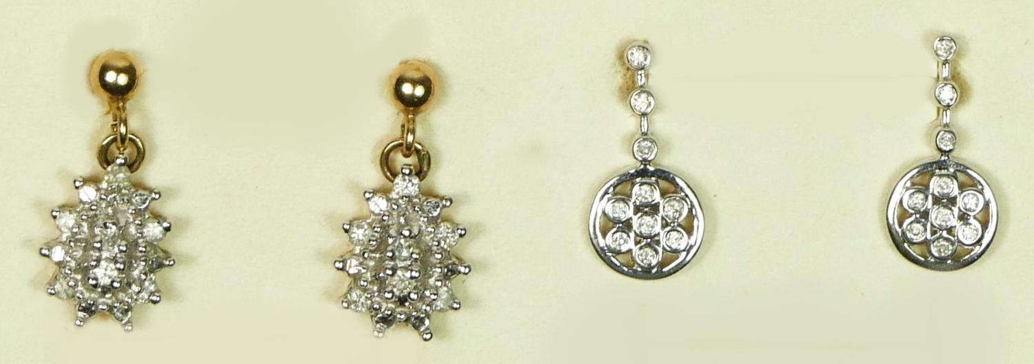 Two pairs of 9ct white gold and brilliant cut diamond ear rings, 3gm.