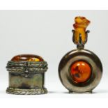A Continental silver and amber mounted circular scent bottle, 6.5cm, bearing control marks and a