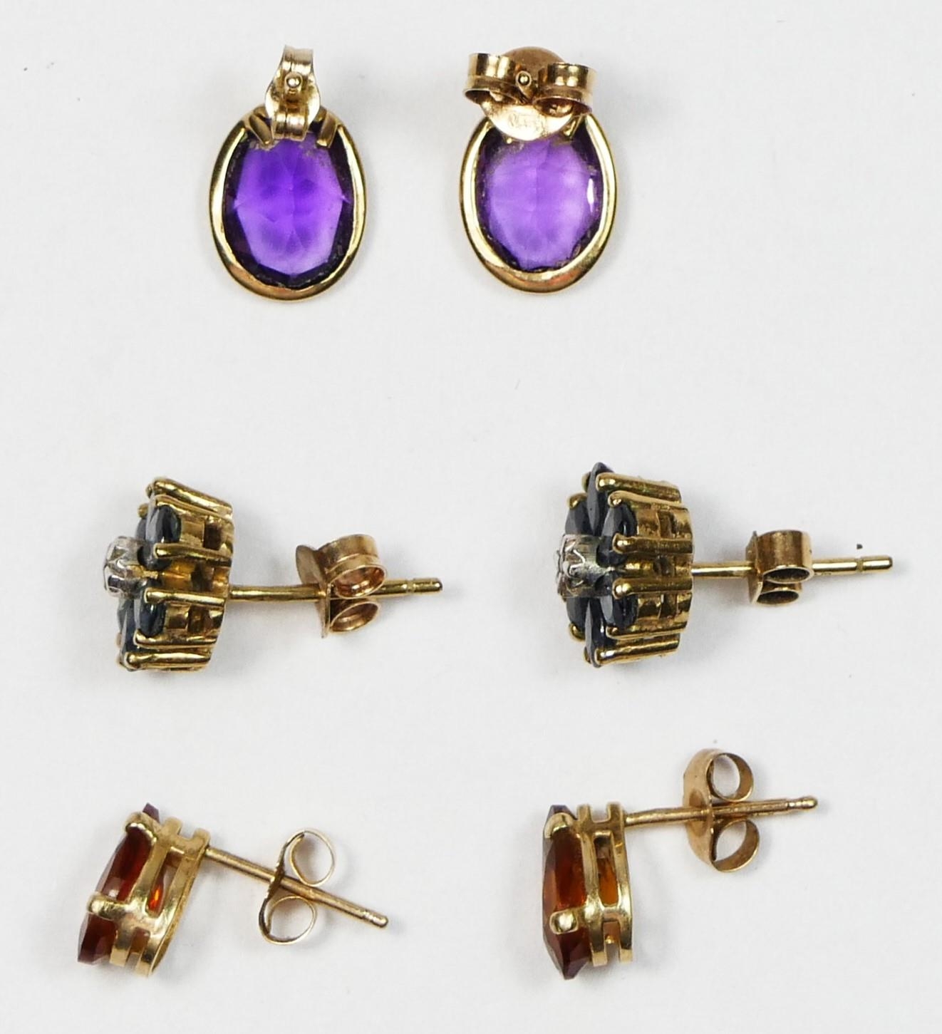 A 9ct gold pair of diamond and sapphire cluster ear studs, a citrine pair and a an amethyst pair, - Image 2 of 2