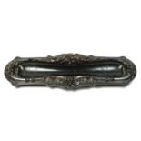 A 19th century French carved lignum vitae pen tray, with mask and floral decoration, 31 x 10cm.