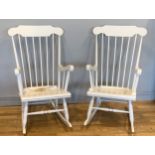 A pair of painted wood rocking chairs, with turned wood detail 50cm x 105cm x 73cm (2)