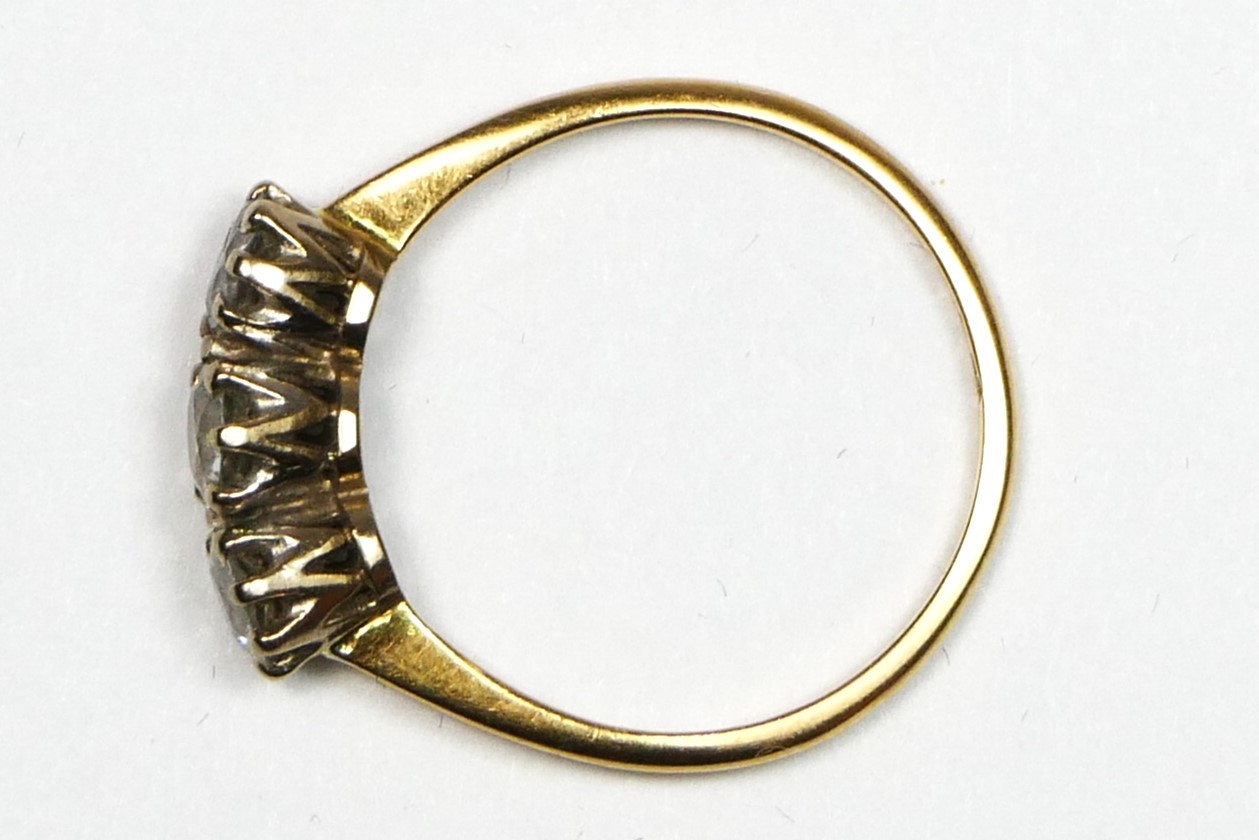 An 18ct gold three stone diamond ring, claw set with old cut stones, total weight approximately 0. - Image 2 of 2