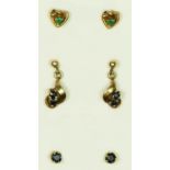 Two pairs of 9ct and sapphire ear rings and an emerald pair, 2.9gm