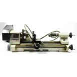 A tabletop watchmakers lathe by Emco 'Unimat 3', boxed.