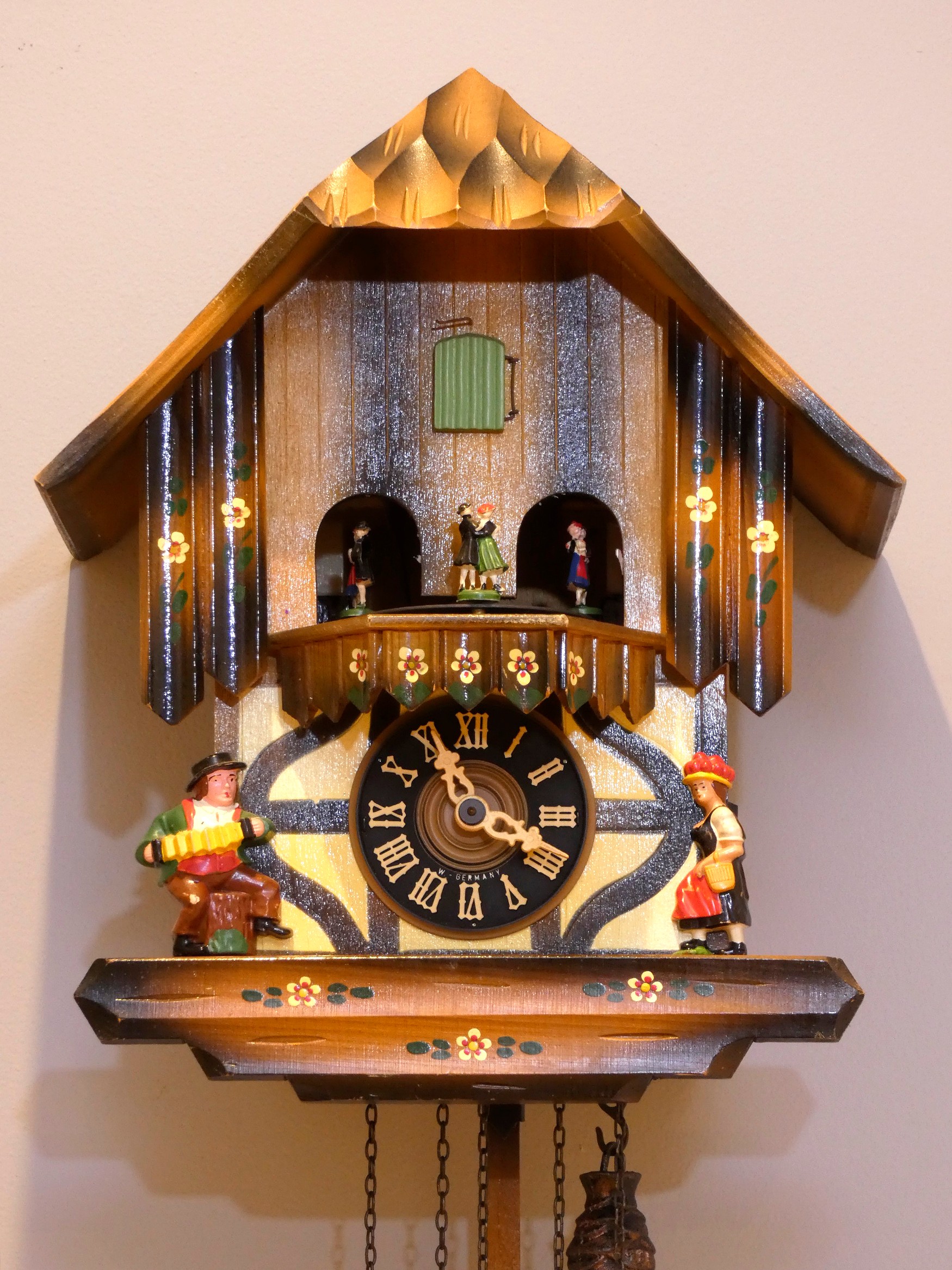 A mid 20th century Black Forest cuckoo clock, having musical carousel, with mechanical three - Image 2 of 2