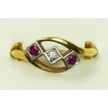 An Art Deco 18ct gold and plat, diamond and ruby three stone ring, U, 4.6gm