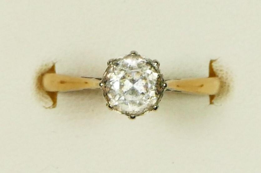 A 9ct gold single 6mm white stone ring, M 1/2, 2.1gm