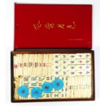 A Chinese bone and bamboo Mah Jong set, complete, wooden case